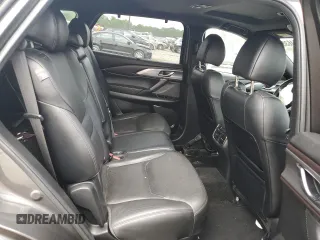 2018 Mazda CX-9 Grand Touring z VIN JM3TCBDY9J0208533, wystawiony jako Copart lot #59854635 z przebiegiem 90 263 mil mil oraz Szkoda całkowita • Salvage title. Historia ofert i sprzedaży dostępna na DreamBid. Obrazek 11.