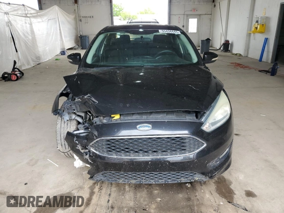 2015 Ford Focus SE с VIN 1FADP3F29FL274320, выставлен на аукционе Copart как лот 55434445 с пробегом 149 126 миль миль и Списание • Salvage title. История ставок и продаж доступна на DreamBid. Изображение 5.