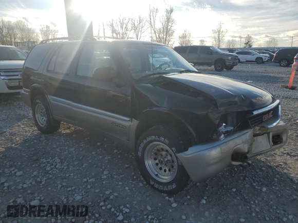 2000 GMC Jimmy SLE Convenience z VIN 1GKDT13W7Y2393191, wystawiony jako Copart lot #82301364 z przebiegiem 160 004 mil mil oraz Czysty tytuł • Clean title. Historia ofert i sprzedaży dostępna na DreamBid. Obrazek 4.