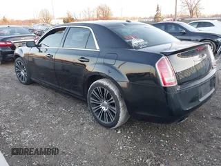 2013 Chrysler 300 with VIN 2C3CCABT8DH644370, listed as a IAAI auction lot 38322039 with 120,874 mi miles. Bid and sale history available at carsss.com. Image 3.