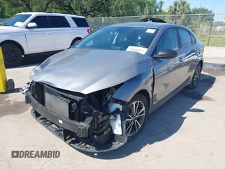 2024 Kia Forte LXS with VIN 3KPF24AD8RE726691, listed as a IAAI auction lot 42026037 with 27,816 mi miles and . Bid and sale history available at DreamBid. Image 2.