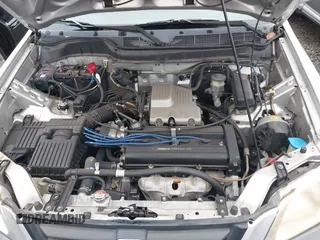 1999 Honda CR-V EX with VIN JHLRD1866XC033865, listed as a IAAI auction lot 41219896 with 142,396 mi miles. Bid and sale history available at carsss.com. Image 10.