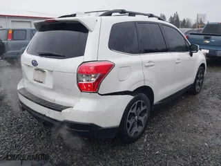 2016 Subaru Forester 2.0XT Premium with VIN JF2SJGDC1GH504685, listed as a IAAI auction lot 41444148 with 138,188 mi miles. Bid and sale history available at carsss.com. Image 4.