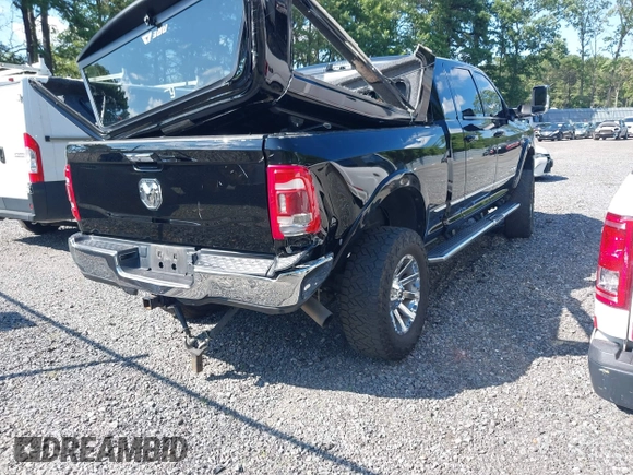 2022 Ram 2500 Limited with VIN 3C6UR5TLXNG377875, listed as a IAAI auction lot 42610178 with 46,390 mi miles and . Bid and sale history available at DreamBid. Image 4.