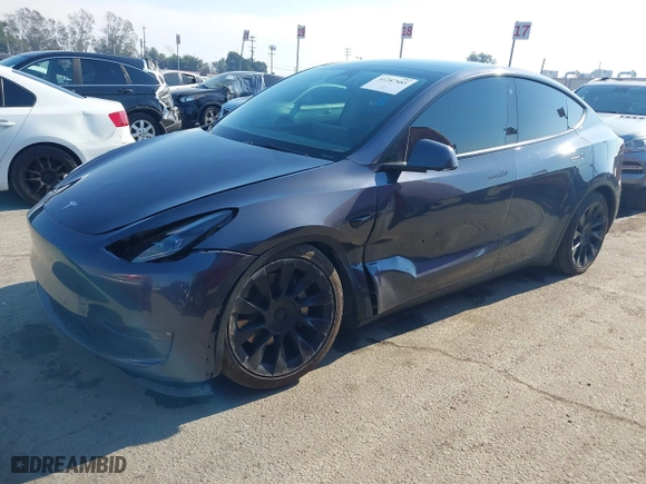 2022 Tesla Model Y Long Range with VIN 7SAYGDEE4NF522698, listed as a IAAI auction lot 41287885 with 82,306 mi miles. Bid and sale history available at carsss.com. Image 20.