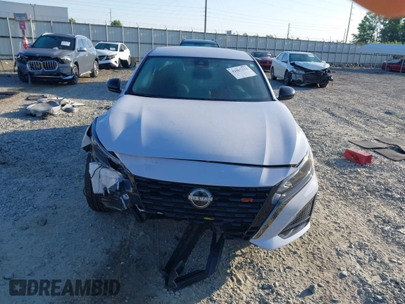 2025 Nissan Altima SR with VIN 1N4BL4CV7SN354284, listed as a IAAI auction lot 42067312 with 15,000 mi miles and . Bid and sale history available at DreamBid. Image 12.