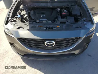 2016 Mazda CX-9 Sport с VIN JM3TCABY7G0111983, выставлен на аукционе Copart как лот 48292595 с пробегом 129 160 миль миль и Чистый • Clean title. История ставок и продаж доступна на DreamBid. Изображение 12.