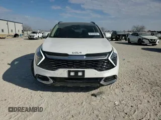 2025 Kia Sportage SX-Prestige with VIN KNDPXCDG1S7177587, listed as a Copart auction lot 42723205 with 6,704 mi miles and Salvage title. Bid and sale history available at DreamBid. Image 12.
