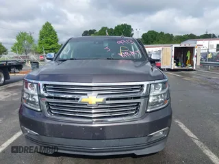 2015 Chevrolet Suburban LTZ with VIN 1GNSKKKC4FR589913, listed as a IAAI auction lot 42017190 with 216,145 mi miles. Bid and sale history available at carsss.com. Image 12.