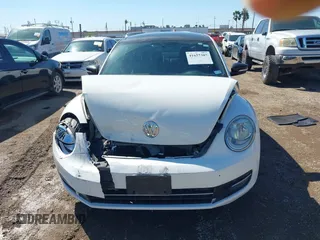 2012 Volkswagen Beetle with VIN 3VWV87AT1CM627756, listed as a IAAI auction lot 41657307 with 81,924 mi miles and . Bid and sale history available at DreamBid. Image 12.
