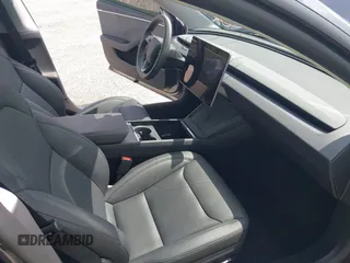 2025 Tesla Model 3 Long Range with VIN 5YJ3E1EA9SF897555, listed as a IAAI auction lot 41886716 with 6,757 mi miles and . Bid and sale history available at carsss.com. Image 5.