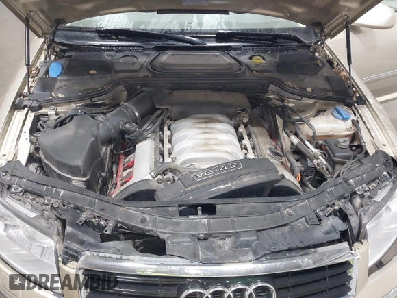 2005 Audi A8 z VIN WAUML44E85N013995, wystawiony jako IAAI lot #42130813 z przebiegiem 53 435 mil mil oraz . Historia ofert i sprzedaży dostępna na DreamBid. Obrazek 10.