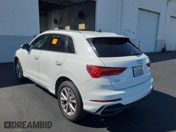2023 Audi Q3 S line Premium with VIN WA1DECF34P1106228, listed as a IAAI auction lot 42734425 with 52,167 mi miles and . Bid and sale history available at DreamBid. Image 4.