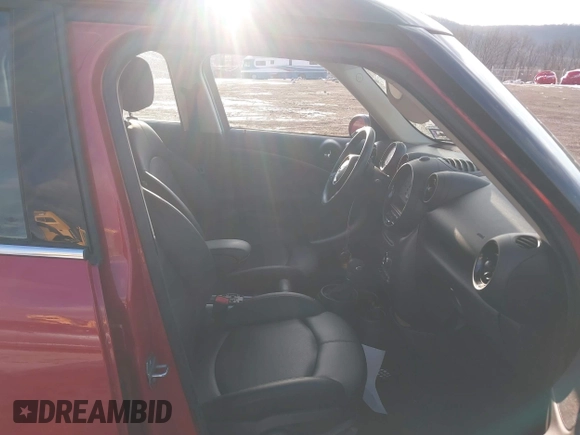 2013 MINI Countryman S z VIN WMWZC3C58DWP22372, wystawiony jako IAAI lot #41523123 z przebiegiem 50 410 mil mil oraz . Historia ofert i sprzedaży dostępna na DreamBid. Obrazek 5.
