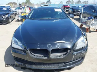2013 BMW 6 Series 650i with VIN WBAYM9C57DDW20178, listed as a IAAI auction lot 41933561 with 72,886 mi miles and . Bid and sale history available at carsss.com. Image 13.
