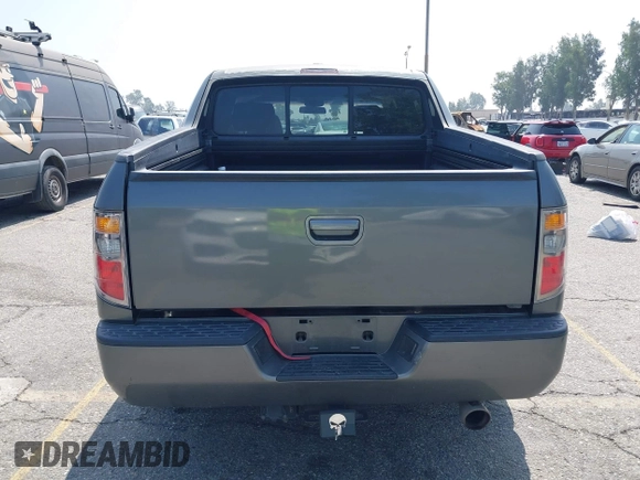 2007 Honda Ridgeline RTL with VIN 2HJYK16547H502601, listed as a IAAI auction lot 42484634 with 197,253 mi miles and . Bid and sale history available at DreamBid. Image 16.