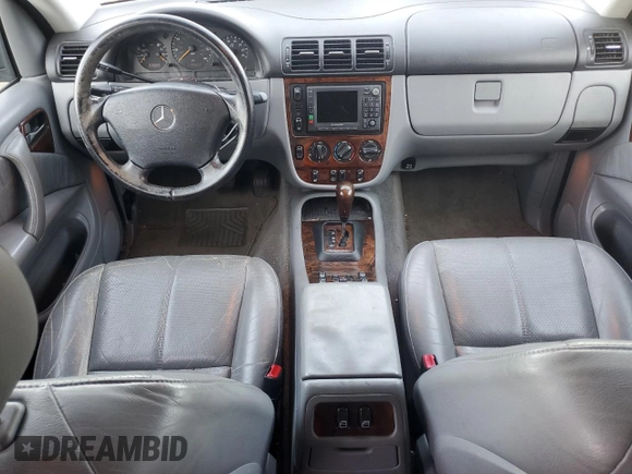 2000 Mercedes-Benz M 320/430/500 with VIN 4JGAB72E0YA167962, listed as a Copart auction lot 89158575 with 194,471 mi miles and Salvage title. Bid and sale history available at DreamBid. Image 8.