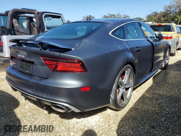 2016 Audi RS 7 Prestige z VIN WUAW2AFC2GN900328, wystawiony jako Copart lot #74450074 z przebiegiem Nie podano mil oraz Nie do naprawy. Historia ofert i sprzedaży dostępna na DreamBid. Obrazek 3.