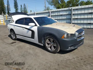 2013 Dodge Charger SE with VIN 2C3CDXBG8DH677551, listed as a Copart auction lot 53260735 with 124,248 mi miles and Salvage Title. Bid and sale history available at DreamBid. Image 4.