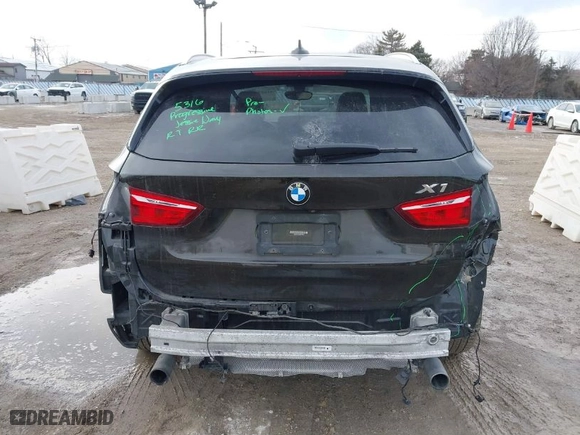 2017 BMW X1 xDrive28i with VIN WBXHT3C38H5F70947, listed as a IAAI auction lot 41652626 with 76,843 mi miles. Bid and sale history available at carsss.com. Image 17.