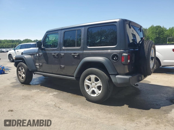 2020 Jeep Wrangler Unlimited Black and Tan with VIN 1C4HJXDGXLW221705, listed as a Copart auction lot 56224785 with 82,360 mi miles and Salvage title. Bid and sale history available at DreamBid. Image 2.