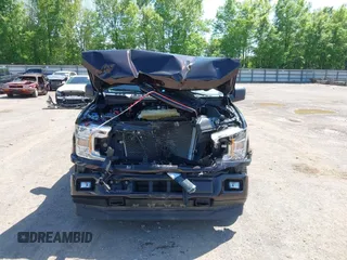 2020 Ford F-150 XL with VIN 1FTEW1EP3LFC56067, listed as a IAAI auction lot 42132791 with 103,357 mi miles and . Bid and sale history available at DreamBid. Image 12.