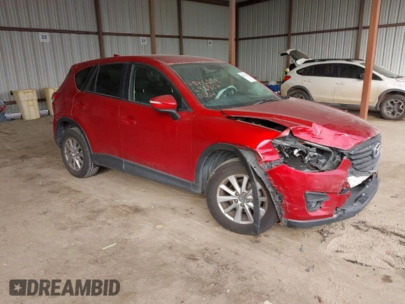 2016 Mazda CX-5 Touring with VIN JM3KE2CY0G0691927, listed as a IAAI auction lot 41611743 with 160,246 mi miles. Bid and sale history available at carsss.com. Image 1.