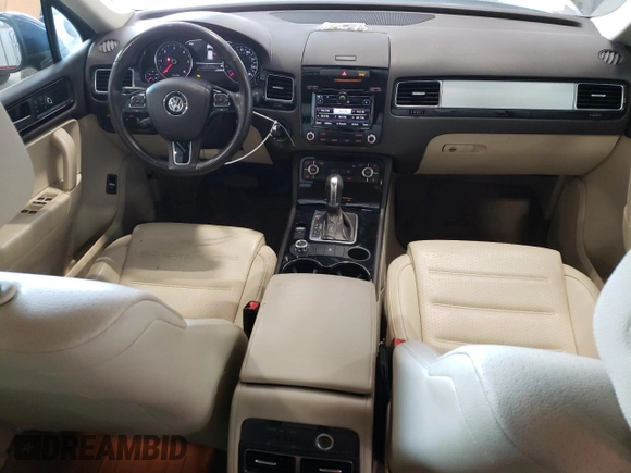 2012 Volkswagen Touareg Sport с VIN WVGEK9BP6CD009633, выставлен на аукционе Copart как лот 85475414 с пробегом 139 872 миль миль и Списание • Salvage title. История ставок и продаж доступна на DreamBid. Изображение 8.