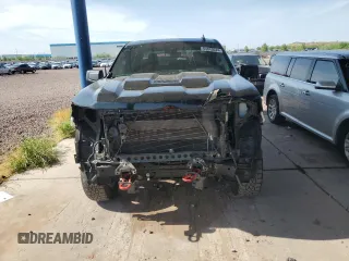 2022 Chevrolet Silverado 1500 Custom Trail Boss with VIN 3GCPDCED0NG631950, listed as a Copart auction lot 64843644 with 49,229 mi miles and Salvage Title. Bid and sale history available at DreamBid. Image 5.
