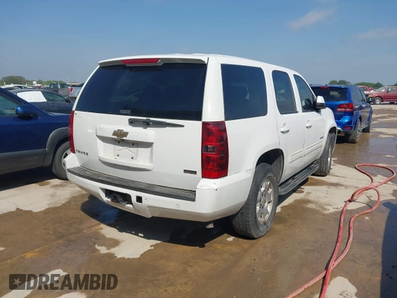 2010 Chevrolet Tahoe LS with VIN 1GNMCAE3XAR215407, listed as a IAAI auction lot 42185643 with 201,070 mi miles and . Bid and sale history available at DreamBid. Image 4.