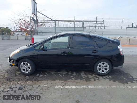 2007 Toyota Prius with VIN JTDKB20U977660315, listed as a IAAI auction lot 42097560 with 158,187 mi miles. Bid and sale history available at carsss.com. Image 15.