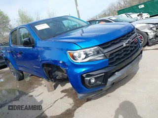 2021 Chevrolet Colorado 4WD Z71 z VIN 1GCGTDEN4M1212479, wystawiony jako IAAI lot #41937713 z przebiegiem 56 164 mil mil oraz . Historia ofert i sprzedaży dostępna na DreamBid. Obrazek 1.