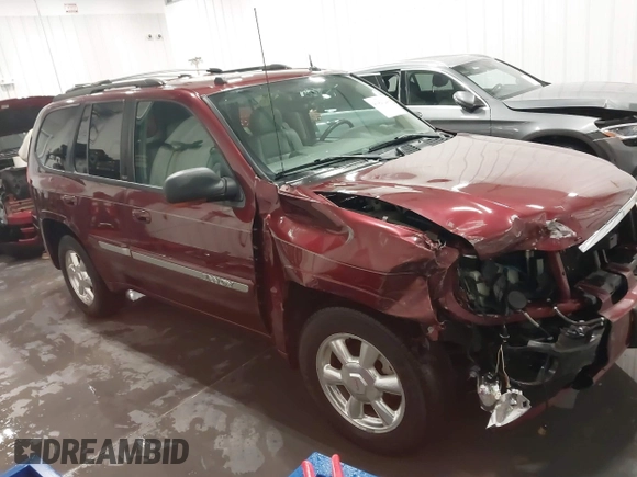 2005 GMC Envoy SLT with VIN 1GKDT13S752214687, listed as a IAAI auction lot 41421248 with 145,388 mi miles. Bid and sale history available at carsss.com. Image 1.