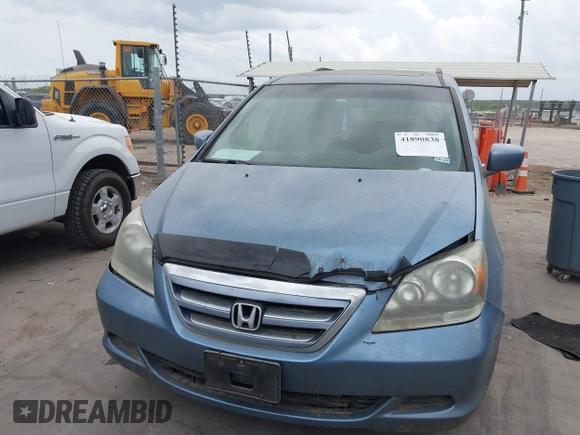 2007 Honda Odyssey EX-L with VIN 5FNRL38717B127157, listed as a IAAI auction lot 41890838 with 195,241 mi miles and . Bid and sale history available at DreamBid. Image 12.
