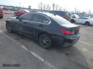 2021 BMW 3 Series 330i xDrive with VIN 3MW5R7J04M8B59583, listed as a IAAI auction lot 41308402 with 45,930 mi miles. Bid and sale history available at carsss.com. Image 3.