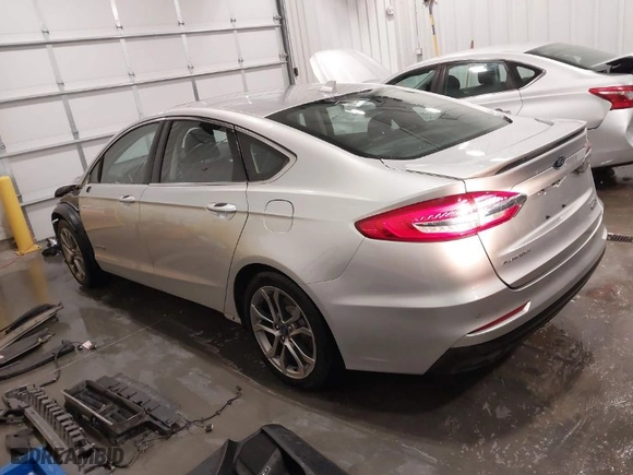2019 Ford Fusion Hybrid Titanium with VIN 3FA6P0RU9KR105317, listed as a IAAI auction lot 41676108 with 102,265 mi miles. Bid and sale history available at carsss.com. Image 3.