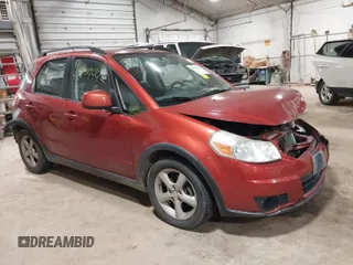 2009 Suzuki SX4 with VIN JS2YB413295100359, listed as a IAAI auction lot 40899442 with 109,919 mi miles. Bid and sale history available at carsss.com. Image 1.
