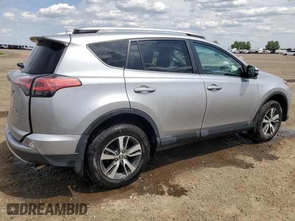 2016 Toyota RAV4 XLE with VIN 2T3RFREV9GW439315, listed as a Copart auction lot 59704345 with 143,198 mi miles and Salvage title. Bid and sale history available at DreamBid. Image 3.