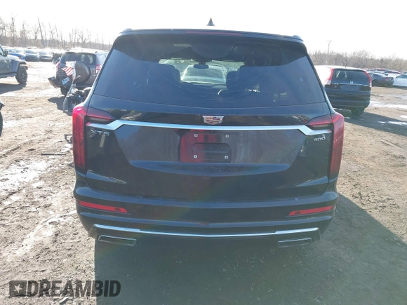 2023 Cadillac XT6 FWD Premium Luxury with VIN 1GYKPCRS1PZ105964, listed as a IAAI auction lot 41525039 with 70,603 mi miles and . Bid and sale history available at DreamBid. Image 16.