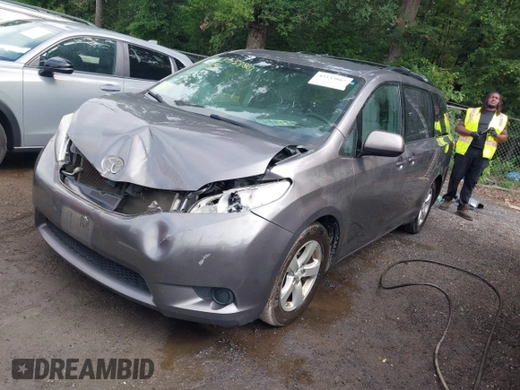 2015 Toyota Sienna LE AAS with VIN 5TDKK3DC8FS632906, listed as a IAAI auction lot 42533867 with 128,980 mi miles and . Bid and sale history available at DreamBid. Image 2.