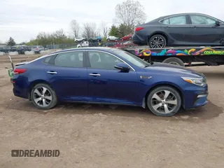 2019 Kia Optima LX with VIN 5XXGT4L38KG304763, listed as a IAAI auction lot 41977858 with 143,569 mi miles. Bid and sale history available at carsss.com. Image 13.