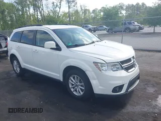 2015 Dodge Journey SXT with VIN 3C4PDCBG0FT653857, listed as a IAAI auction lot 42128410 with 182,960 mi miles and . Bid and sale history available at DreamBid. Image 1.