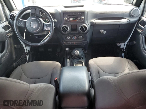 2017 Jeep Wrangler Unlimited Sport with VIN 1C4BJWDG5HL617193, listed as a Copart auction lot 63617355 with 68,304 mi miles and Salvage title. Bid and sale history available at DreamBid. Image 8.