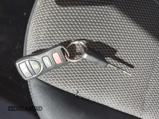2015 Nissan Sentra S z VIN 3N1AB7AP2FY353036, wystawiony jako IAAI lot #42027149 z przebiegiem 132 432 mil mil oraz . Historia ofert i sprzedaży dostępna na DreamBid. Obrazek 11.