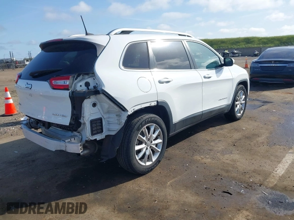 2016 Jeep Cherokee Limited with VIN 1C4PJMDS4GW310495, listed as a IAAI auction lot 41978324 with 70,182 mi miles. Bid and sale history available at carsss.com. Image 4.