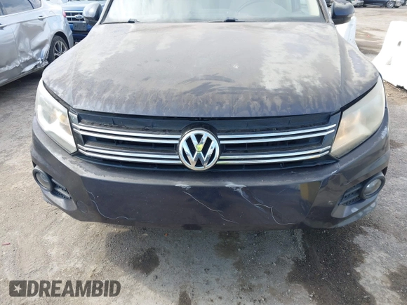 2012 Volkswagen Tiguan S with VIN WVGAV7AX9CW546724, listed as a IAAI auction lot 42831149 with 103,528 mi miles and . Bid and sale history available at DreamBid. Image 6.