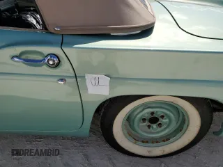 1957 Ford Thunderbird with VIN D7FH182410, listed as a Copart auction lot 77671374 with 319 mi miles and Salvage Title. Bid and sale history available at DreamBid. Image 12.