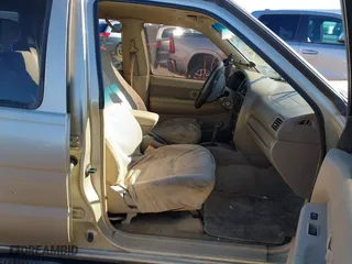 2002 Nissan Pathfinder LE with VIN JN8DR09Y82W713507, listed as a IAAI auction lot 41253781 with 302,501 mi miles. Bid and sale history available at carsss.com. Image 5.