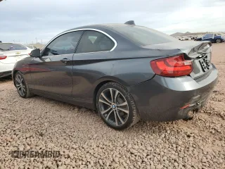 2015 BMW 2 Series 228i with VIN WBA1F5C57FV257639, listed as a Copart auction lot 86645114 with 73,094 mi miles and Salvage Title. Bid and sale history available at carsss.com. Image 2.