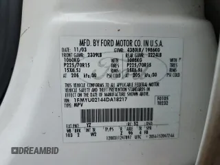 2004 Ford Escape XLS with VIN 1FMYU02144DA18217, listed as a Copart auction lot 43136895 with 135,424 mi miles and Salvage Title. Bid and sale history available at DreamBid. Image 13.